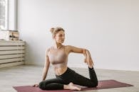 A Woman Doing Yoga while Looking Afar